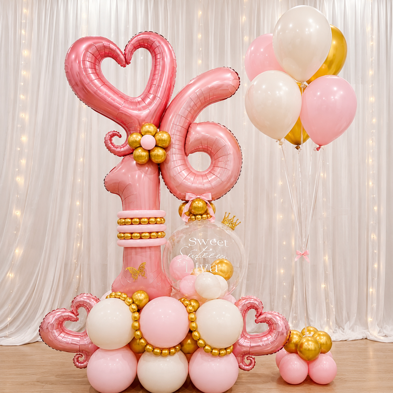 Sweet sixteen birthday display featuring large pink number 16 and heart balloons, pink, white, and gold balloon accents, a personalized clear “Sweet Sixteen” balloon, and matching floating balloons against a white draped backdrop.